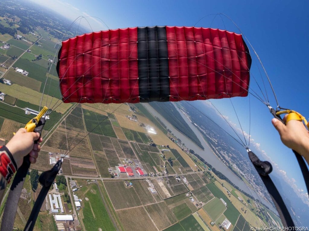 a person holding a parachute
